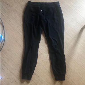 black sweatpants w flower detail